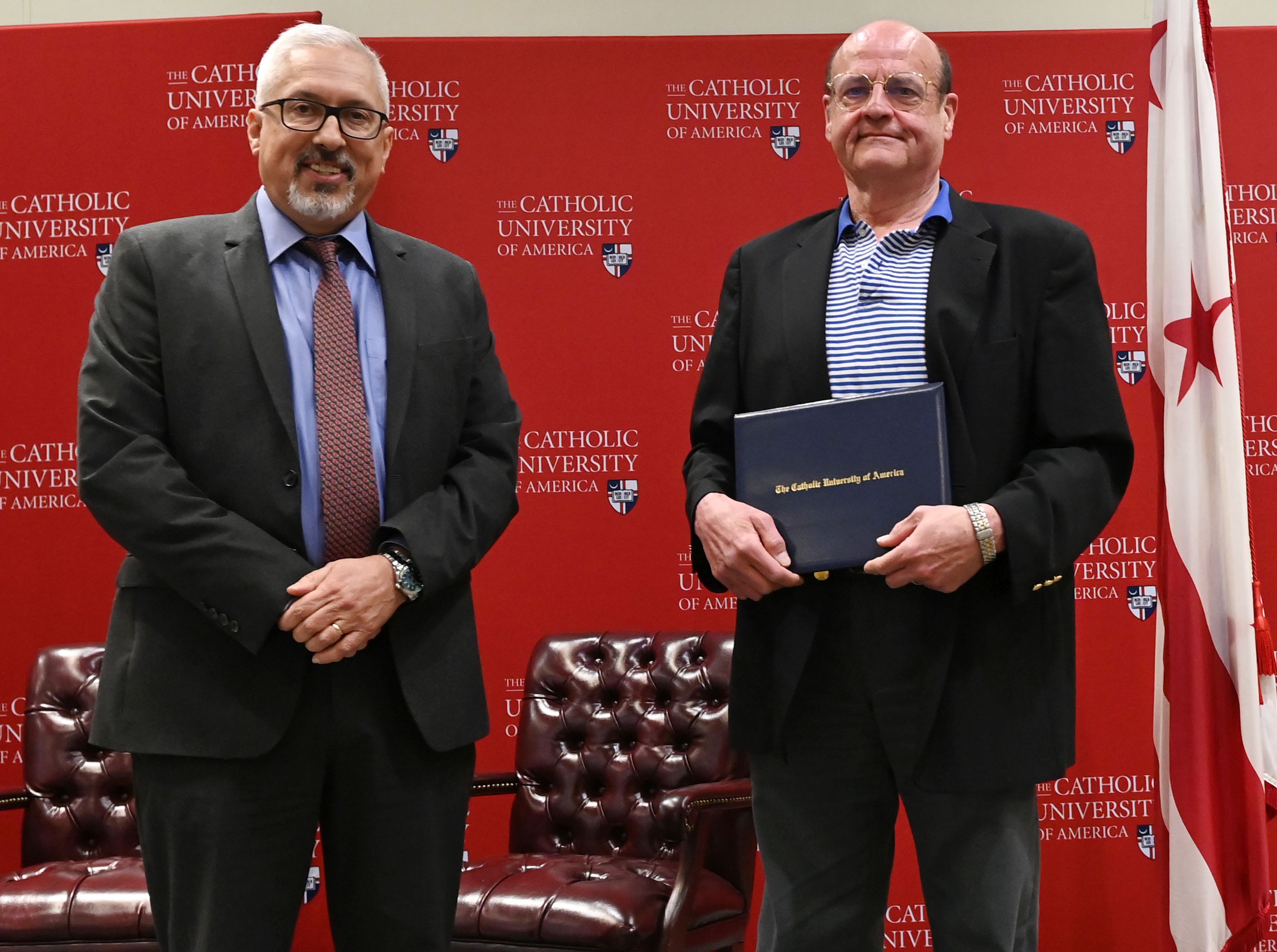 Professor Poos Honored with Provost’s Teaching Award