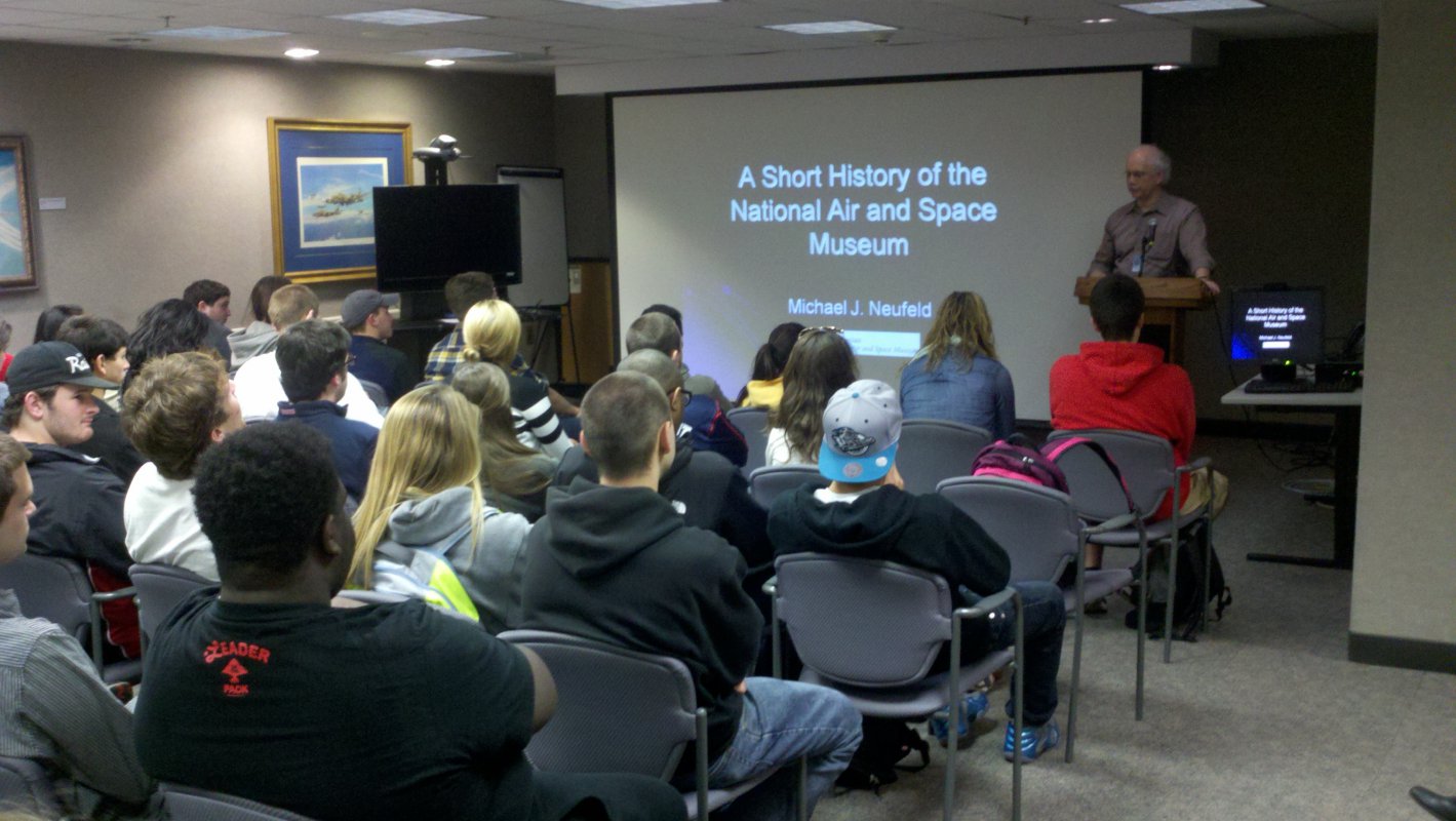 Dr. Neufeld gives a presentaton to CUA students on the history of the Air and Space Museum.