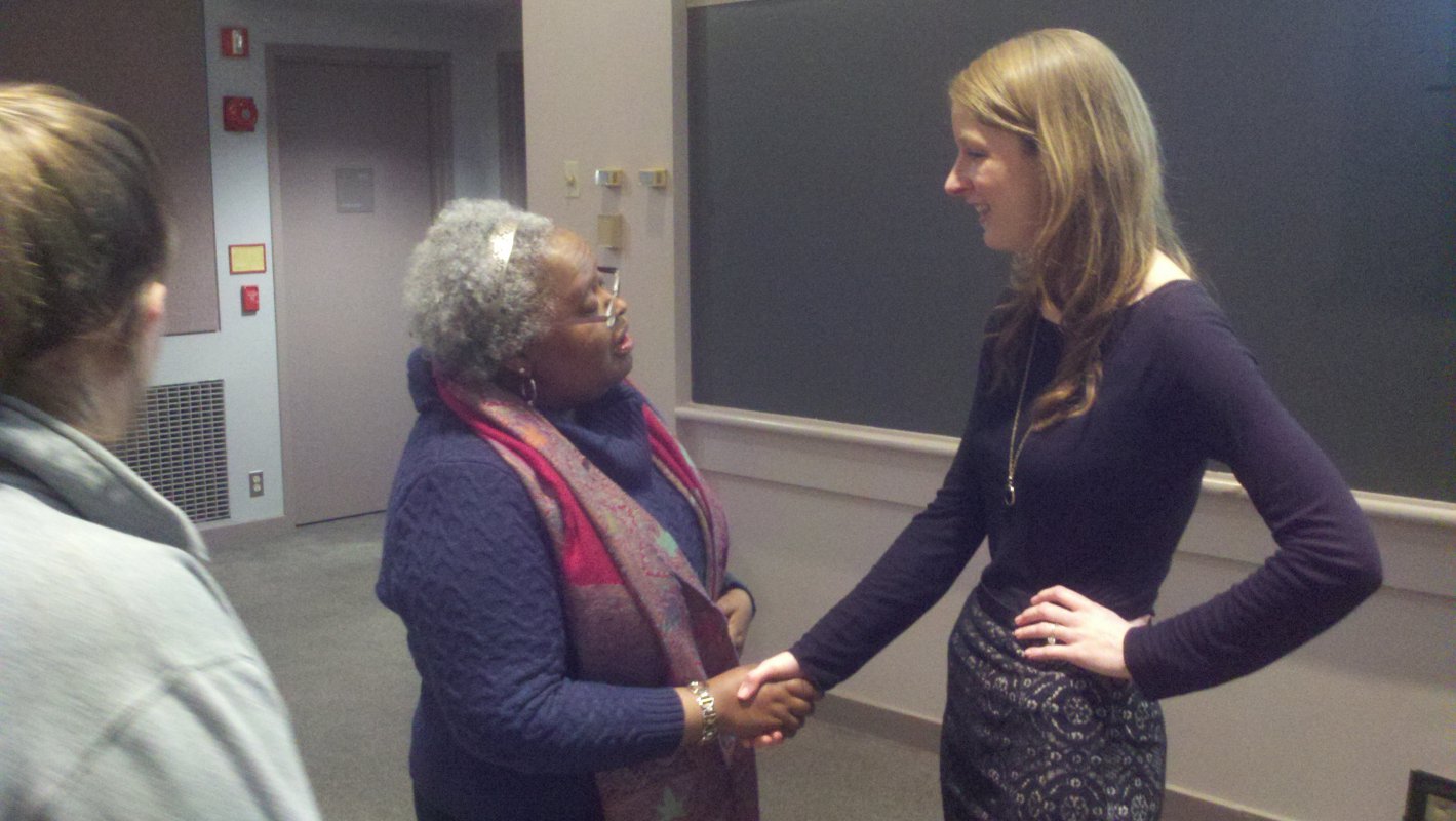 Christine Glunz, a CUA alumna who worked for the White House's Council on Environmental Quality, talks with Dr. Daughtery following Ms. Glunz's talk with students.