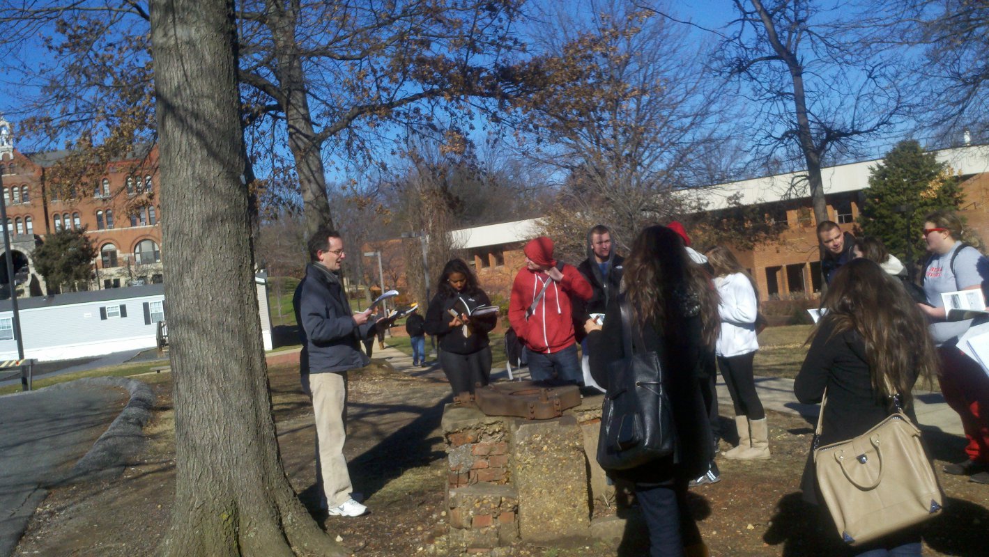 Dr. Green shows students the site of the old CUA Observatory.