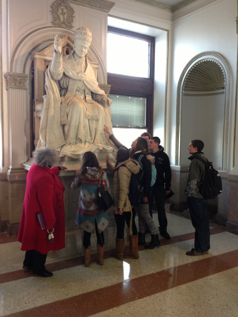 Dr, Daughtery discusses statues on campus honoring important figures in the history of the Catholic Church. (photo taken 1/17/14).