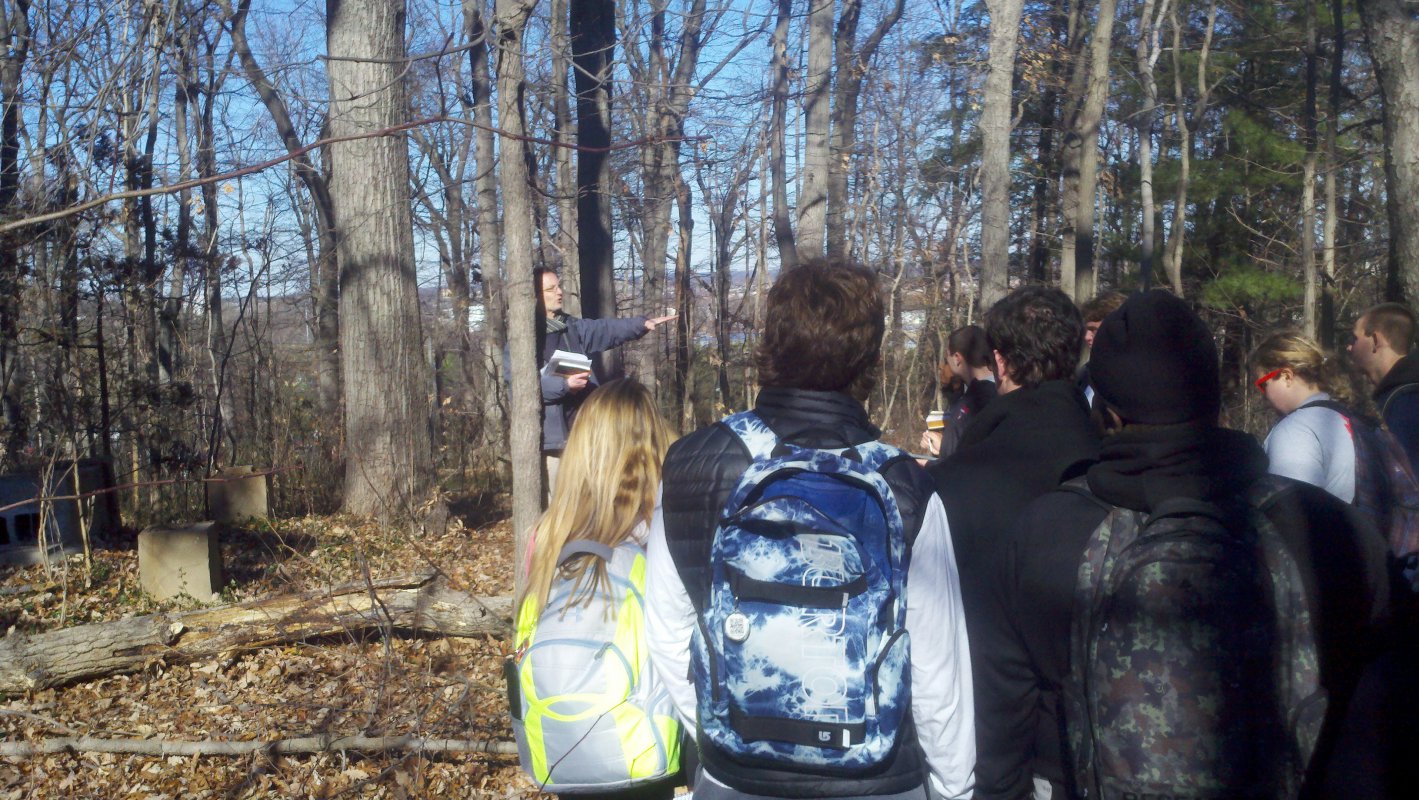 Dr. Green explaining to students the significance of this Civil War outpost on the outskirts of the CUA campus.